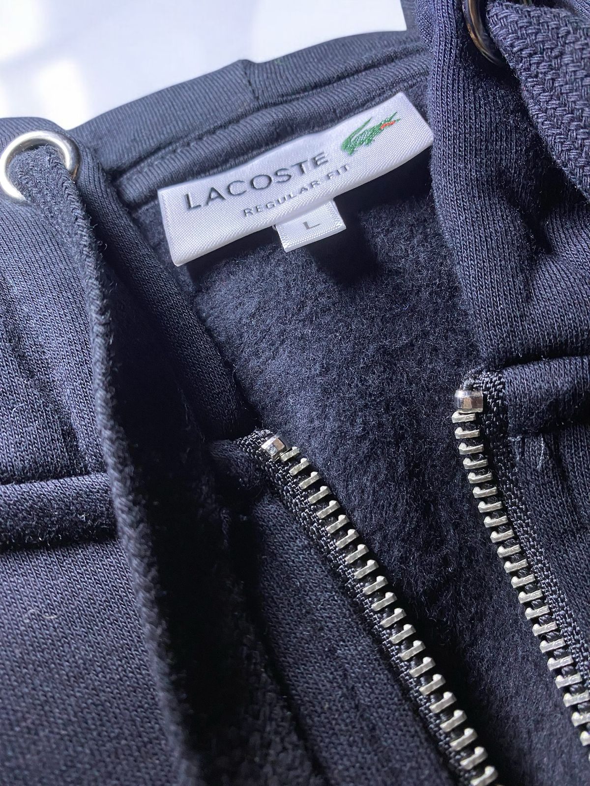 Polerón Lacoste